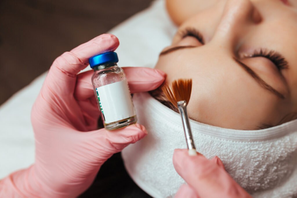 Woman getting a chemical peel treatment at a medical spa