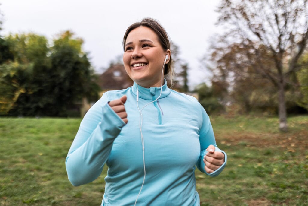 Woman running outside during morning workout